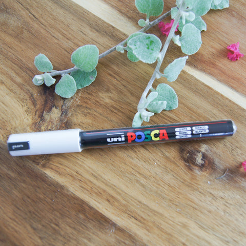 White paint POSCA fine tip pen